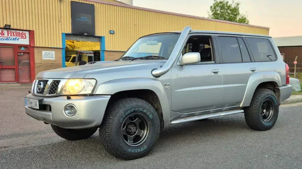 Silver Nissan Patrol Y61 (1997+) fitted with 16" Gunmetallic BRADLEY V wheels and Comforser CF1100 Tyres