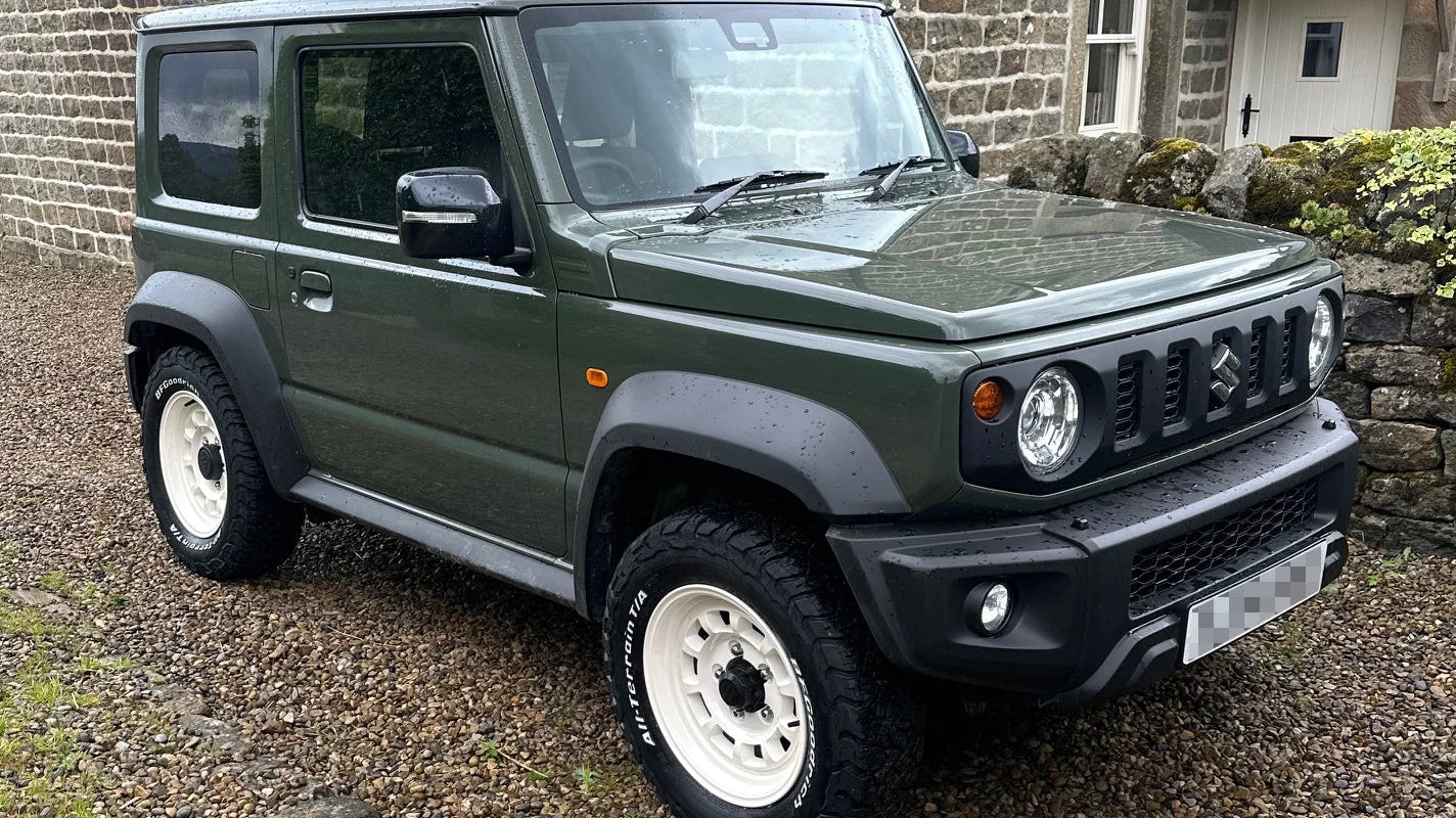 Jungle Green Suzuki Jimny (2018+) with 16" High Peak J-01 wheels in Vintage White and BF Goodrich KO3 tyres