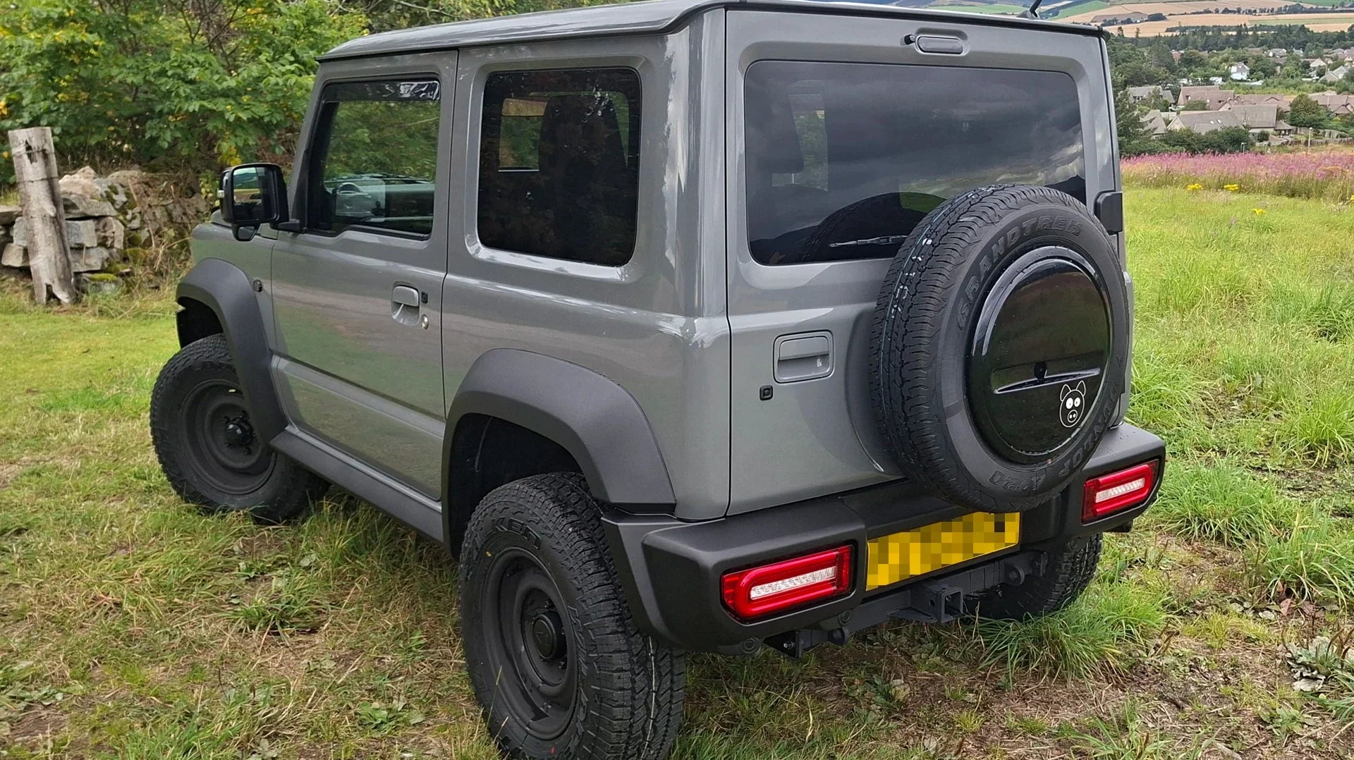 Suzuki Jimny (2018+) with APIO WILDBOAR SR+ wheels, JIMNYSTYLE Touring suspension, Retro Grille and LED tail lights