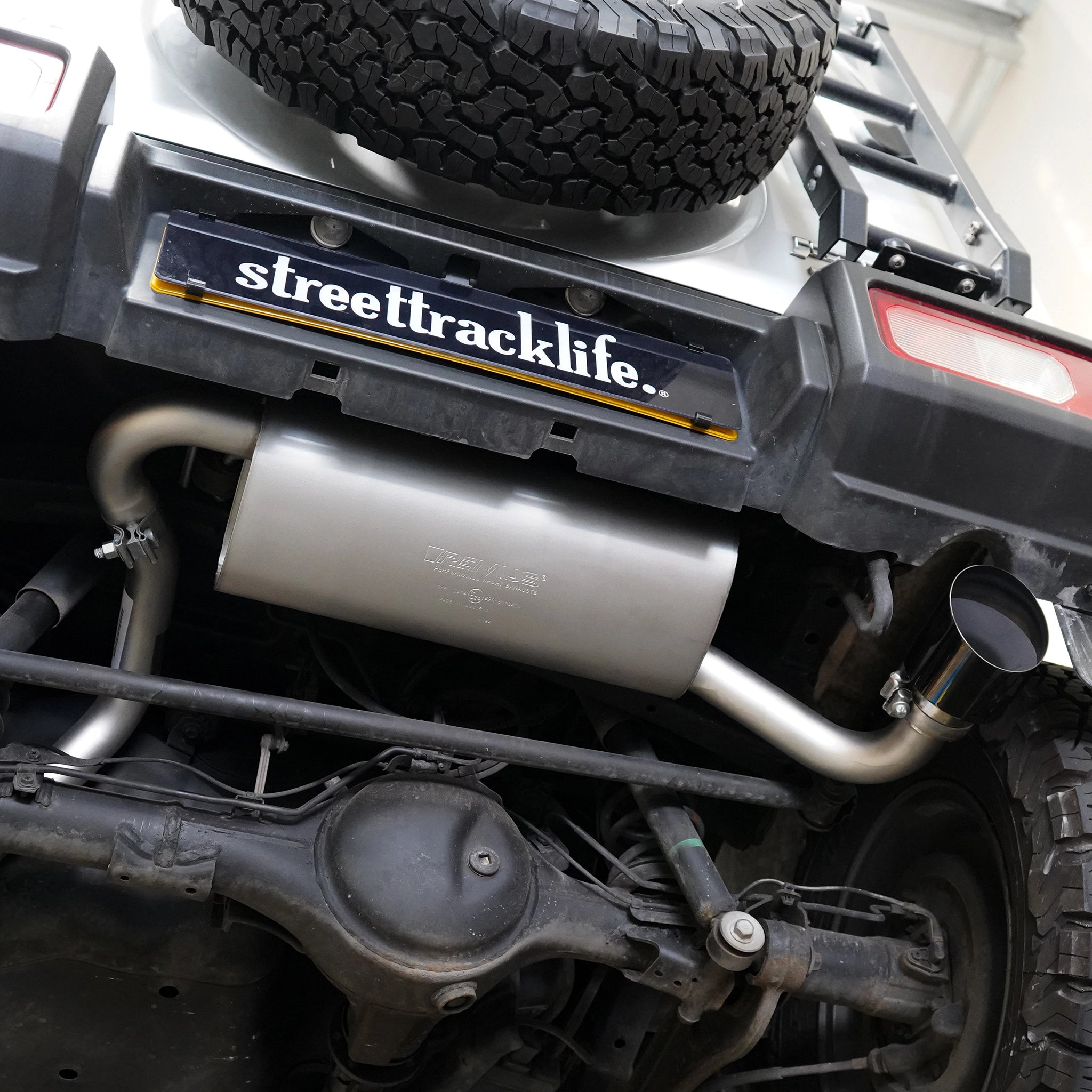 Close-up of a Jimny exhaust system by Remus jimny performance upgrade