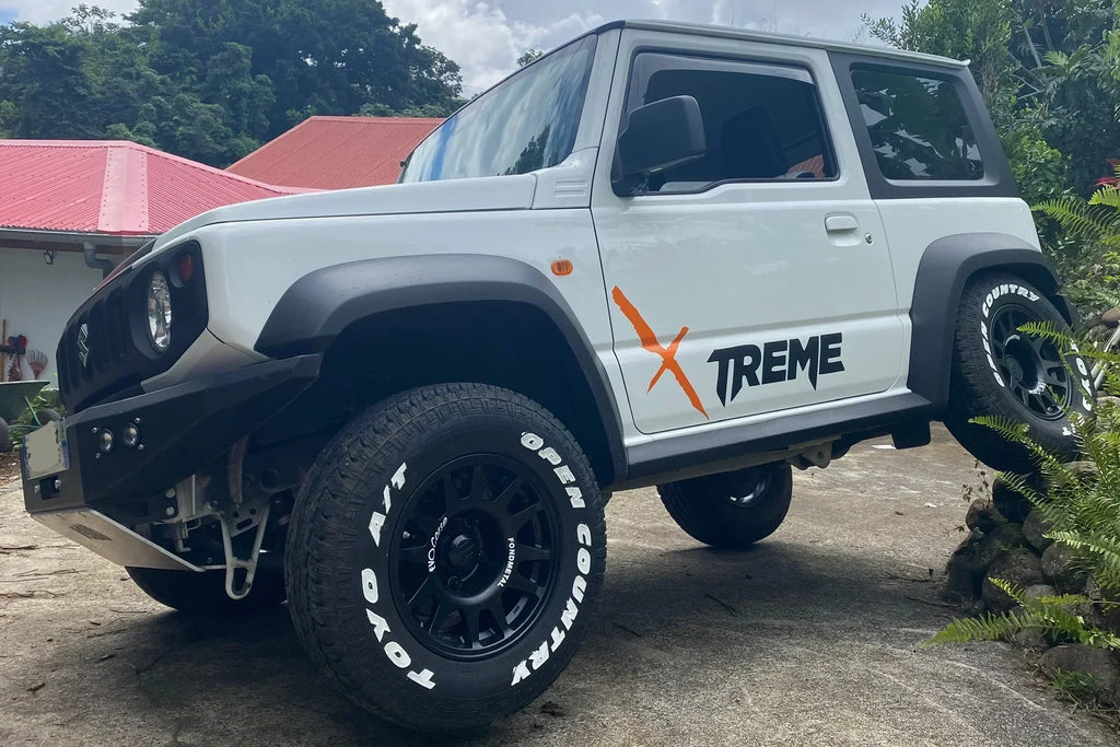 Suzuki Jimny (2018+) with -25ET EVO Corse DakarZero wheels in Matte Black