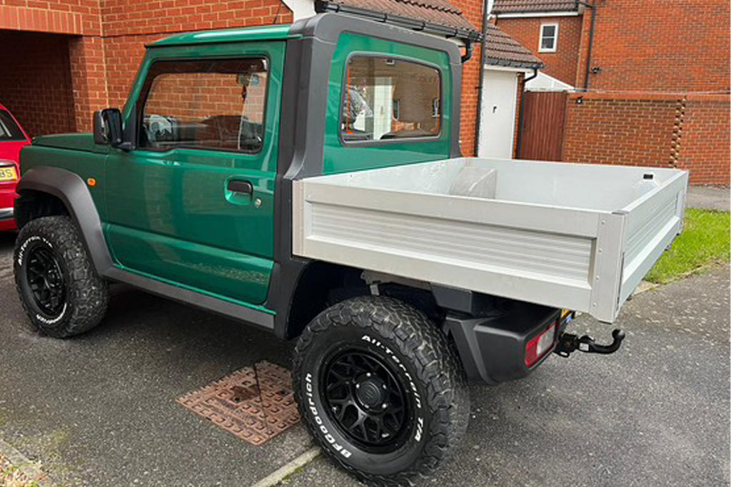 Suzuki Jimny (2018+) pick up truck fitted with Satin Black Magpie M-01 wheels