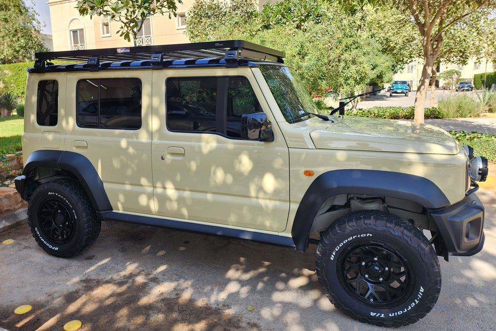 Beige Suzuki Jimny fitted with Matte Black Magpie M-01 Wheels